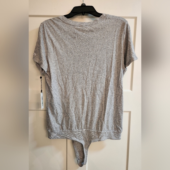 Calvin Klein body suit. Size Large. Nwt - Picture 2 of 2